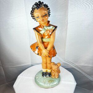 Vintage Ceramic Figurine – Black Girl in Orange Dress with Dog